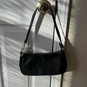 Black and gold peta and Jain bag